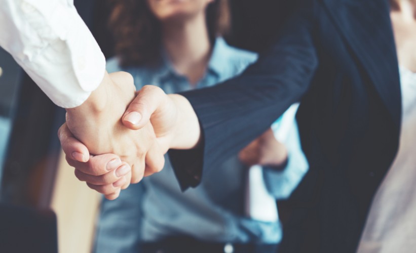 Two people shaking hands